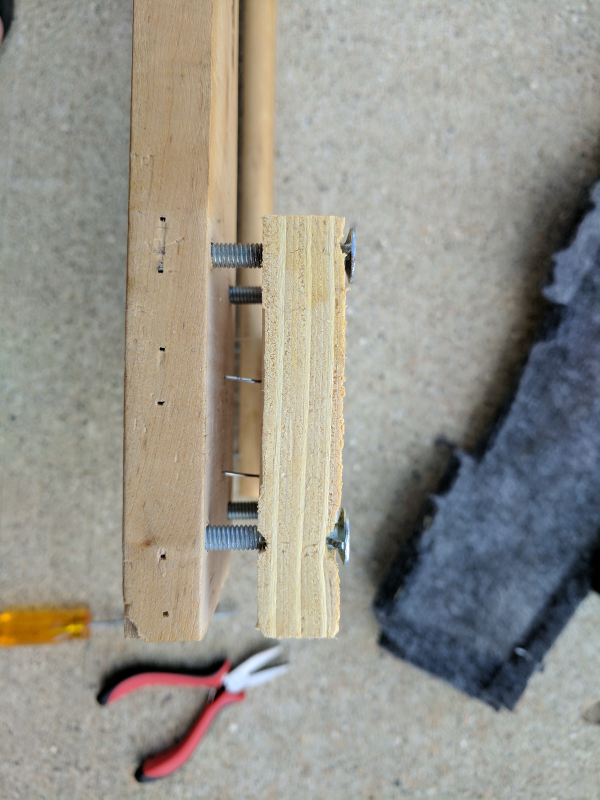 Tiny nails holding the wood together that serve no other purpose.